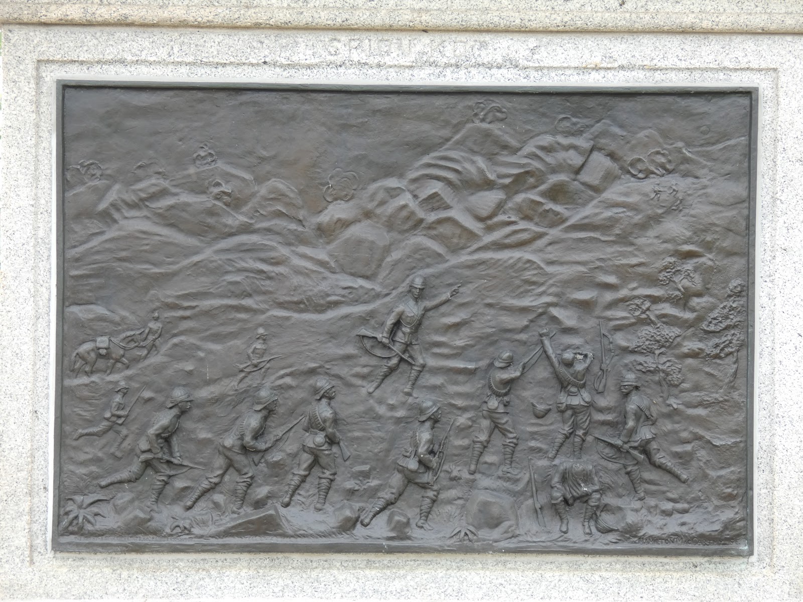 Right side plaque depicts the attack on the Boer position at the Battle of Spion Kop where Lieutenant Osborne fell.