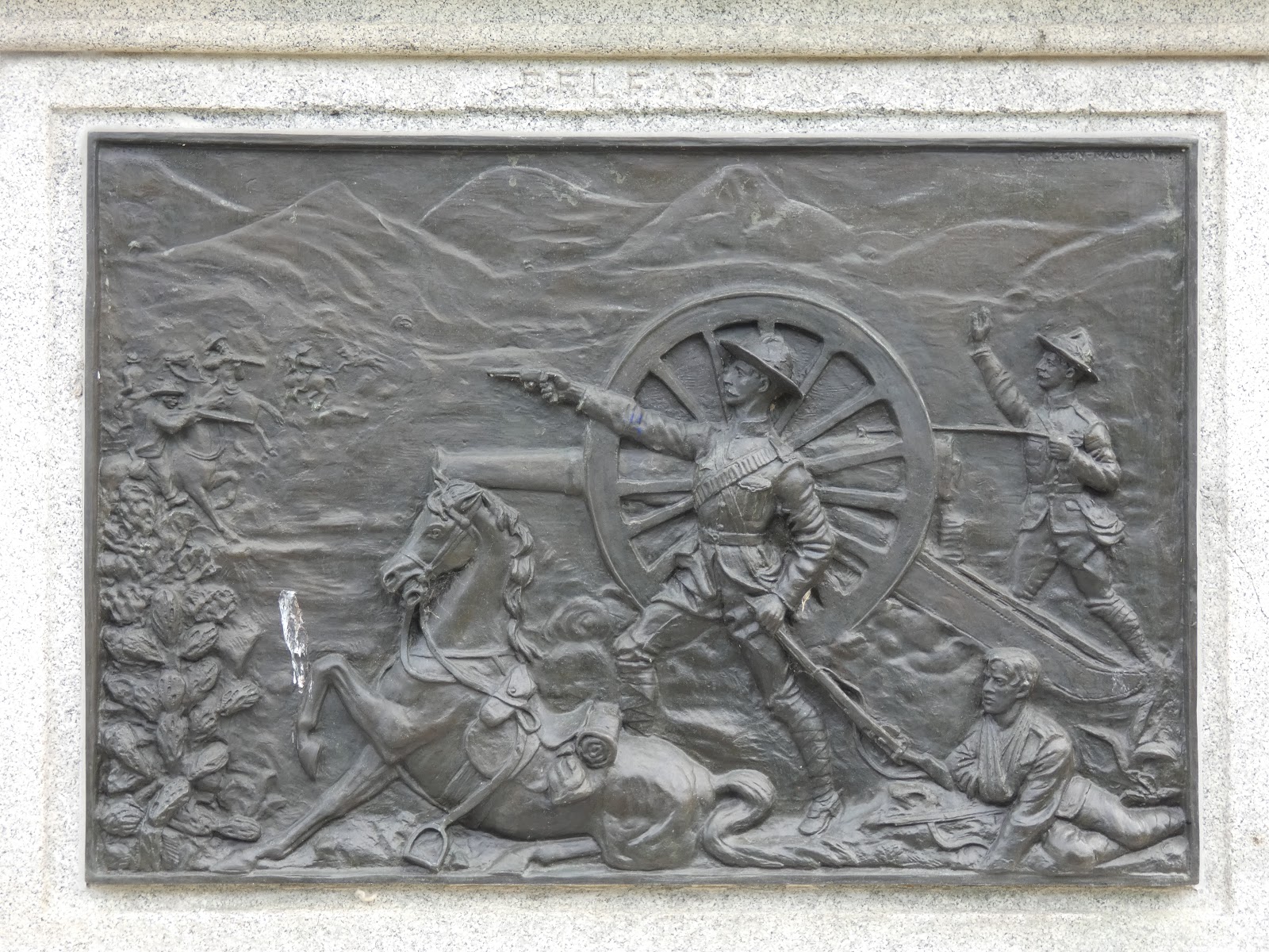 Back plaque depicts the defense of the British guns at the Battle of Belfast where Lieutenant Builder suffered fatal injuries.