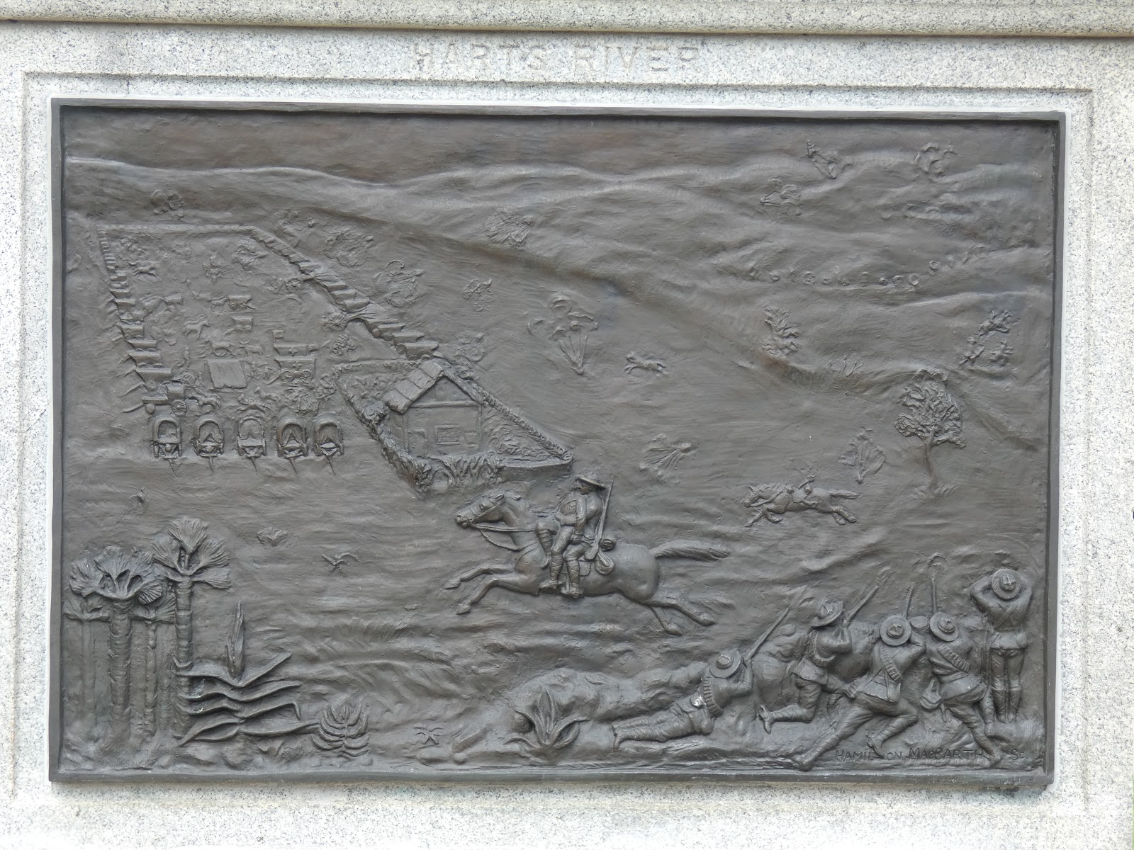 Left side plaque depicts the Battle of Hart's River where Corporal Sherritt lost his life.