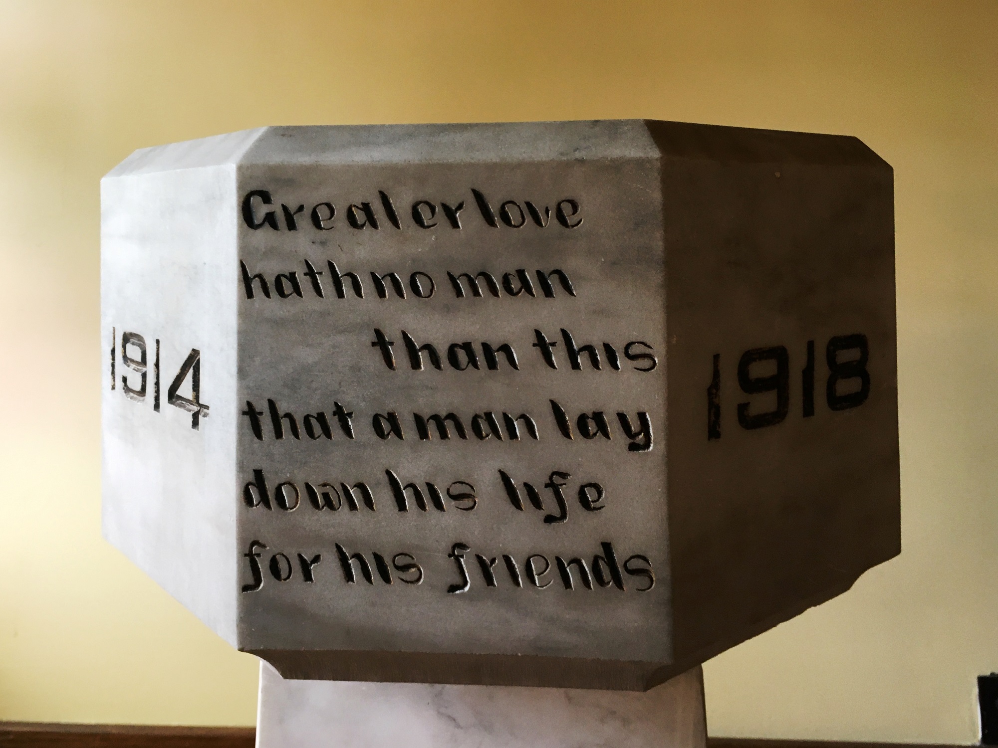 Inscription on the side of the top of the Memorial Font.