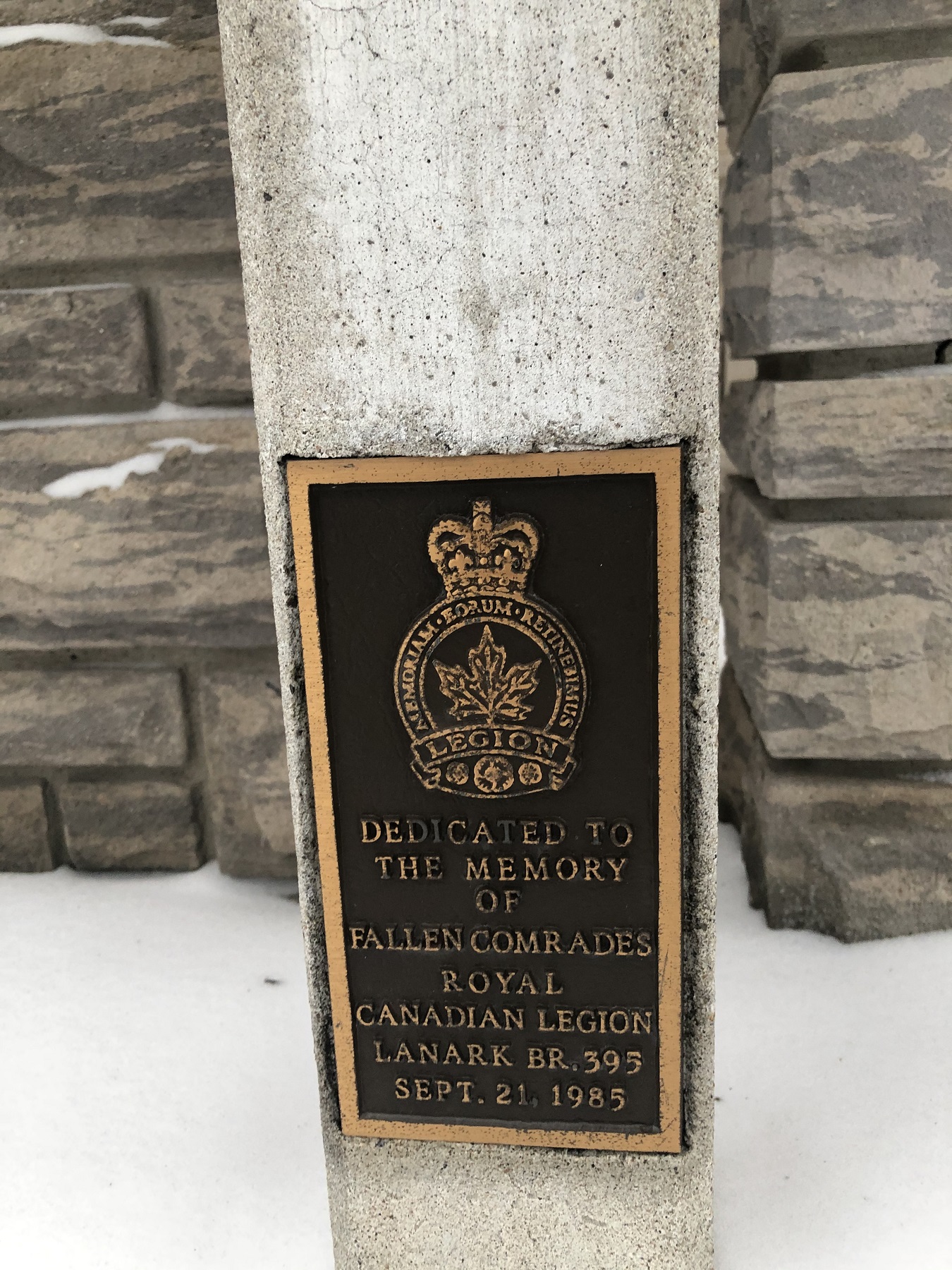 plaque on cross