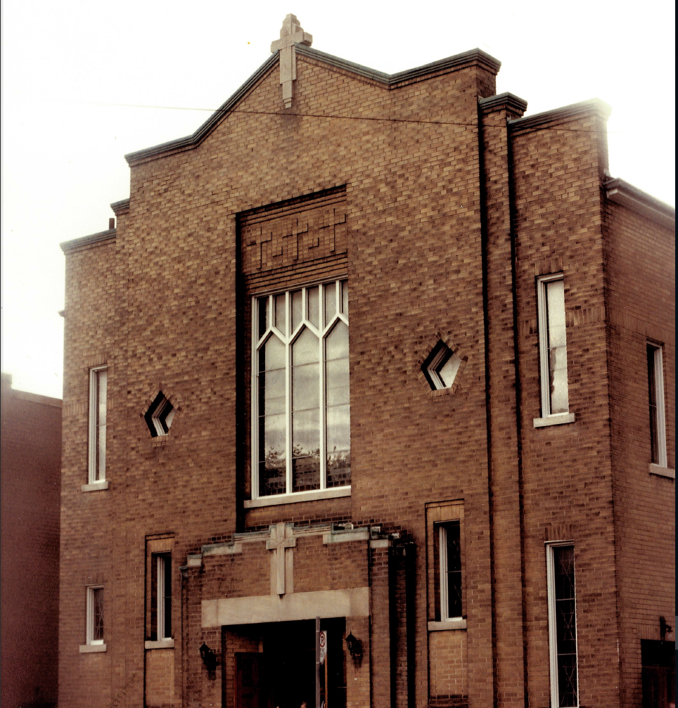 Window located in the old church choir loft.