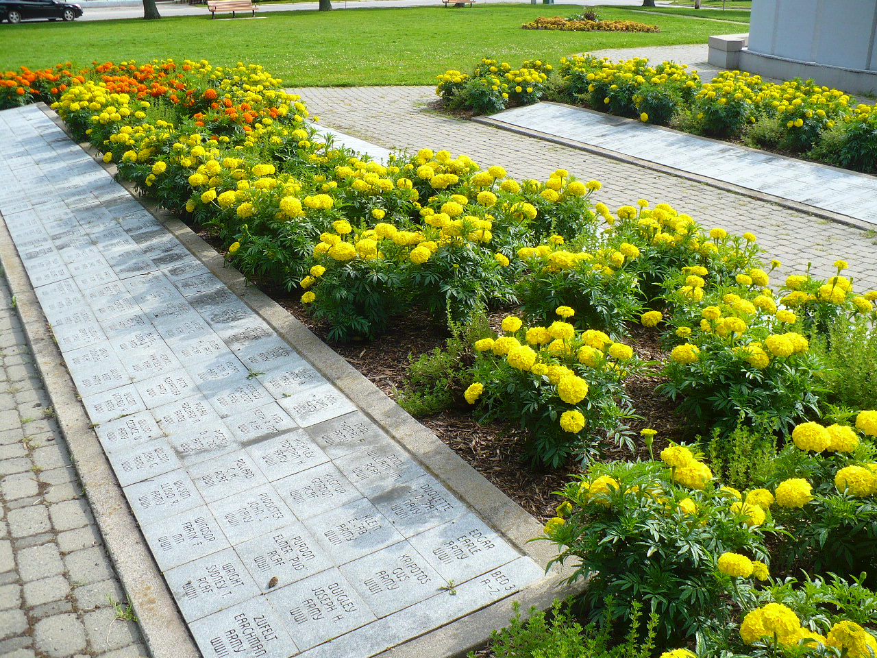 Commemorative stones recognizing Veterans who survived the wars.