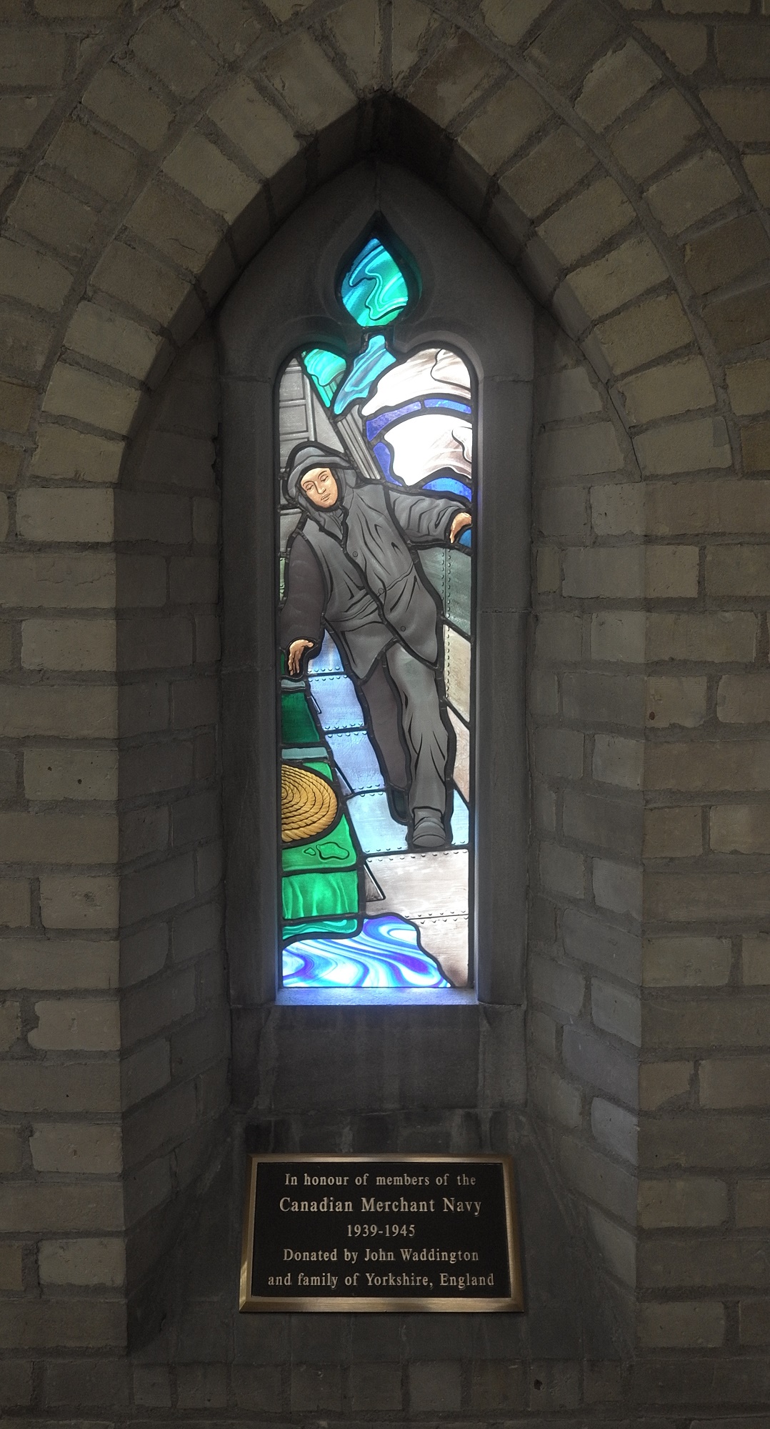 stained glass window and plaque