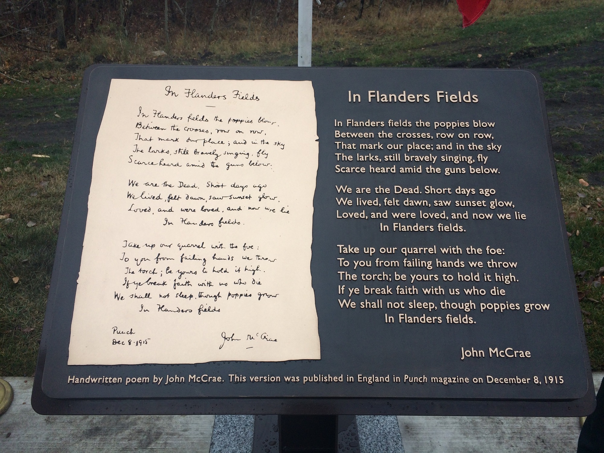 Bronze plaque with handwritten poem by John McCrae.