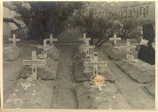 Nun paying respects to the Fallen Canadians