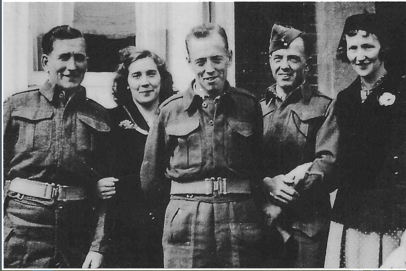 Photo of John and Trixie (at right)