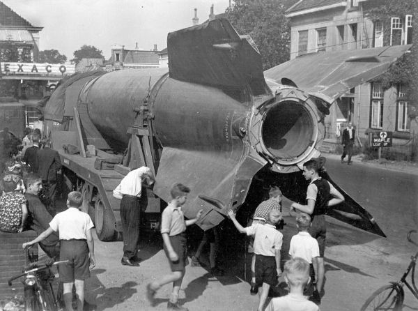 Dutch children exploring a bomb.