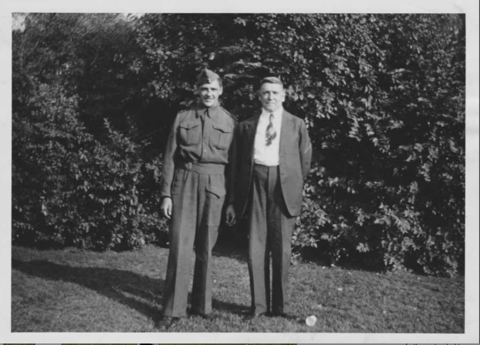 Photo of John and his father.