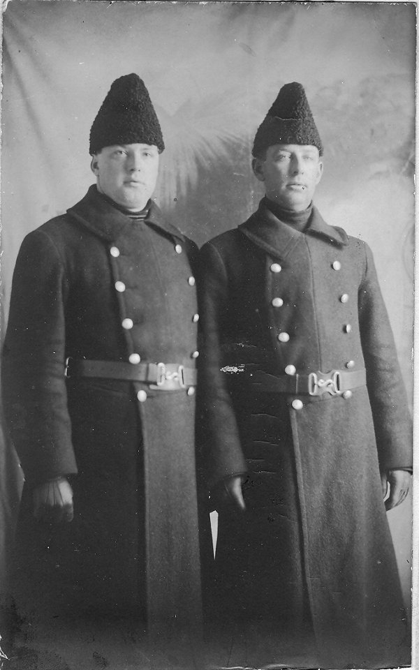 Photo of John and fellow police officer